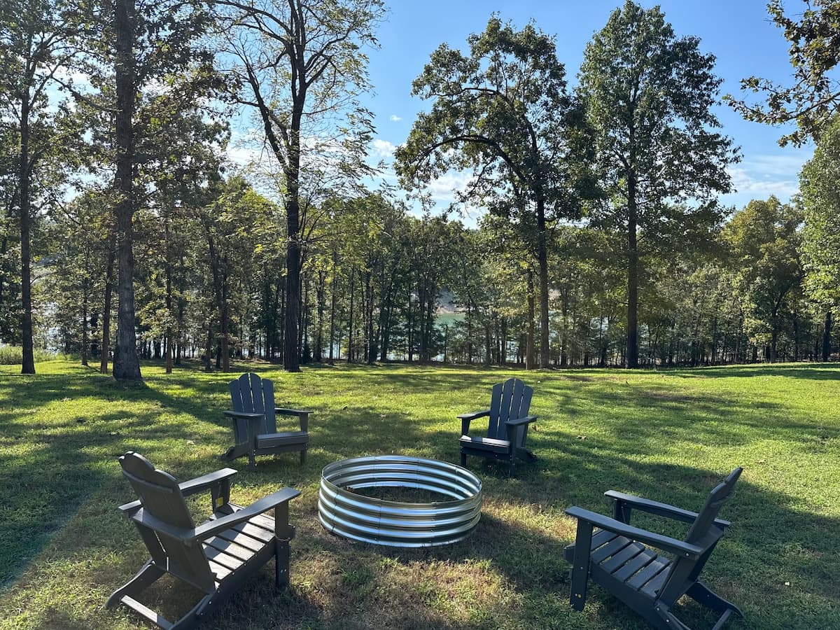 Fire pit area with Adirondack chairs